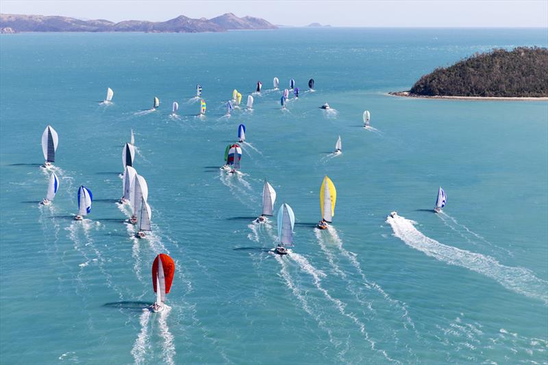 Heading for the wide, blue yonder: Some of the more than 200 yachts at Hamilton Island Race Week 2017 sail toward Whitsunday Passage photo copyright Andrea Francolini taken at Hamilton Island Yacht Club and featuring the IRC class