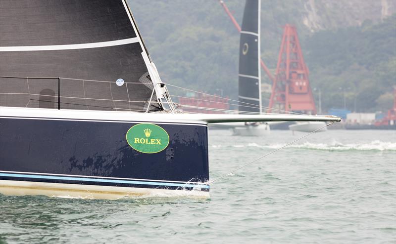 Alive crosses tack with MOD70 Beau Geste before Lei Yue Mun. Rolex China Sea Race 2018 photo copyright photo RHKYC / Guy Nowell taken at Royal Hong Kong Yacht Club and featuring the IRC class