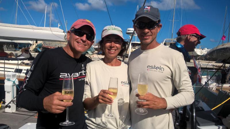 Jeremi Jablonski, owner/skipper of Hanse 43 Avanti with Estela and Luigi Miranda, owners of GS52LC Estela from Puerto Rico celebrating Avanti's win today and Estela Miranda's birthday - 2018 BVI Spring Regatta photo copyright Event Press taken at Royal BVI Yacht Club and featuring the IRC class