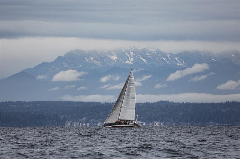 The majestic Olympic Mountains provide a dramatic backdrop to the CYC Seattle's 2017 Puget Sound Spring Regatta photo copyright Jan Anderson taken at Corinthian Yacht Club of Seattle and featuring the IRC class