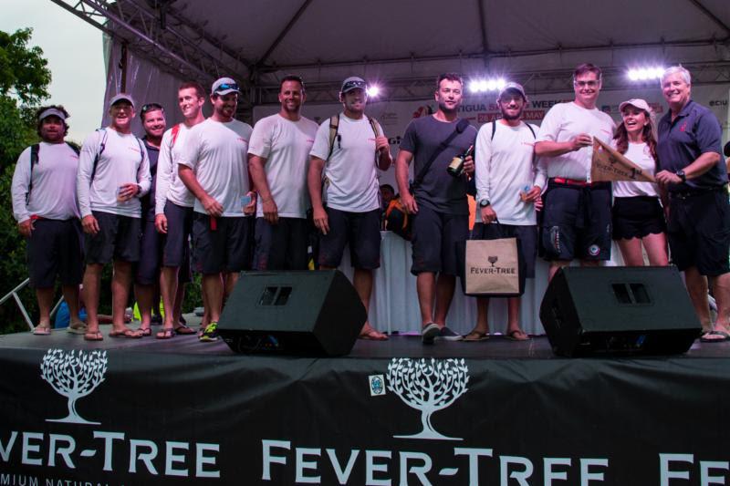 Stephen Murray Jr's team on the Volvo 70 Warrior celebrate their win on Fever-Tree Race Day - 2018 Antigua Sailing Week photo copyright Ted Martin taken at Antigua Yacht Club and featuring the IRC class