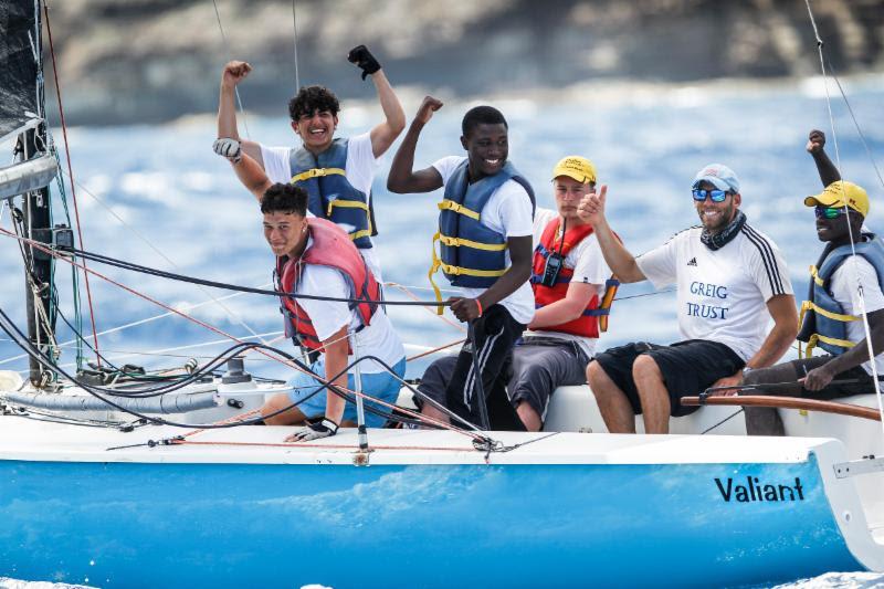 Celebrating a place on the podium! 2nd place in the Johnnie Walker Race Day for youth sailors from the Greig City Academy, London  - 2018 Antigua Sailing Week photo copyright Paul Wyeth taken at Antigua Yacht Club and featuring the IRC class