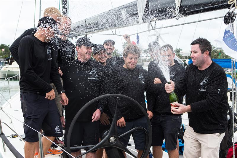 Smuggler crew celebrating their IRC overall win - 2018 PONANT Sydney Noumea Yacht Race photo copyright Bryan Gauvan taken at Cruising Yacht Club of Australia and featuring the IRC class