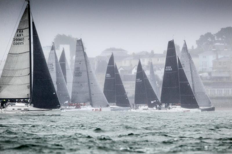 A Royal Yacht Squadron start and inclement conditions for the race around the Isle of Wight on day five of the IRC Europeans, incorporating the Commodores' Cup - 2018 IRC European Championship and Commodores' Cup photo copyright Paul Wyeth / pwpictures.com taken at Royal Ocean Racing Club and featuring the IRC class