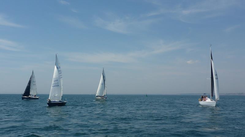 Poole Yacht Racing Association members in the Round the Island Race 2018 photo copyright Mike Fox taken at Poole Yacht Racing Association and featuring the IRC class