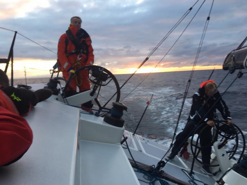 Giles Redpath at the wheel of Pata Negra at sunrise photo copyright Chris Hanson taken at Royal Ocean Racing Club and featuring the IRC class