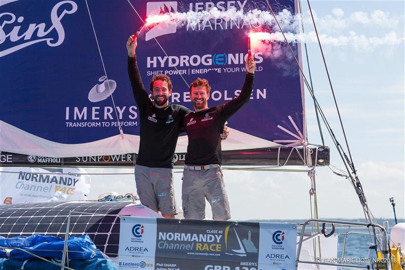 From left Julien Pulvé and Phil Sharp at the finish of the Normandy Channel Race, 2018  photo copyright Jean-Marie LIOT taken at  and featuring the IRC class
