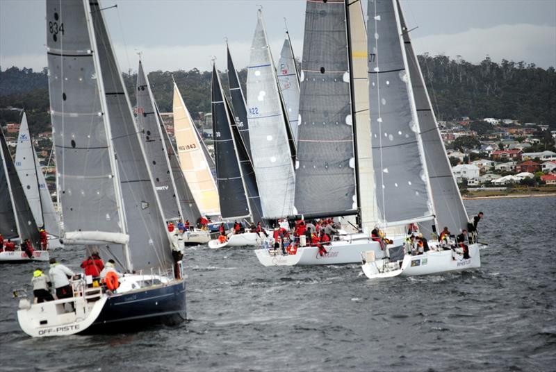 The 16 boat fleet hits the line at Friday's evening's start of the Maria Island Race photo copyright Peter Campbell taken at Royal Yacht Club of Tasmania and featuring the IRC class