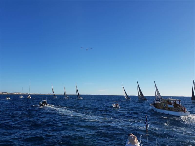 Race underway with vintage planes overhead - 2019 Bunbury and Return Ocean Race photo copyright Casey Walsh taken at Royal Freshwater Bay Yacht Club and featuring the IRC class