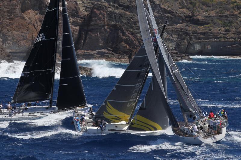 Ocean Racers, the Canadian Pogo 12.50 Hermes, co-skippered by Meg Reilly and Morgen Watson is seen here at the start of the RORC Caribbean 600 under the Pillars of Hercules, Antigua  - photo © Tim Wright / Photoaction.com
