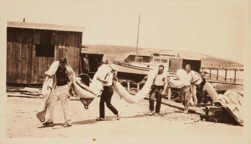 Teamwork was needed to move the enormous mainsail - photo © Transpacific Yacht Club