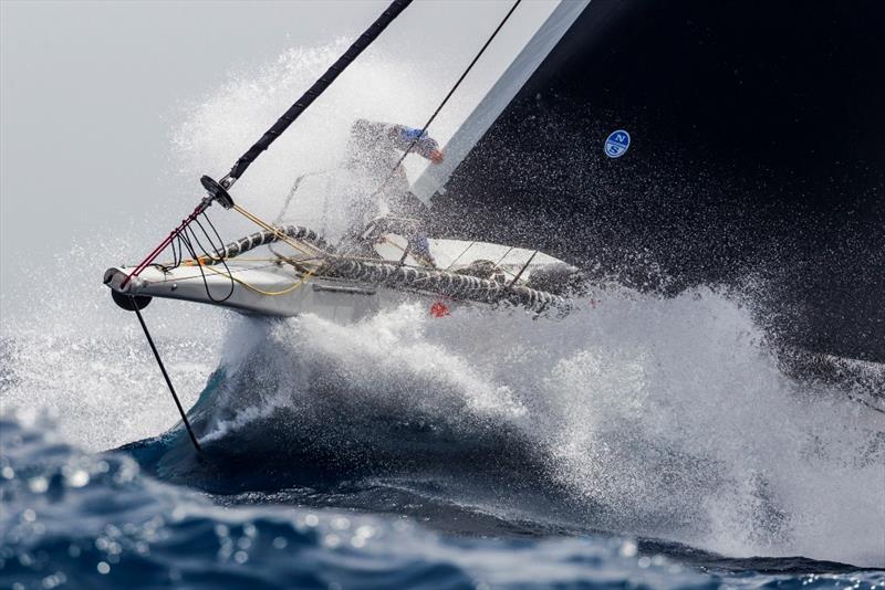 Wet ride on the bow of George David's Rambler 88. - Rolex Giraglia 2019 - photo © IMA / Studio Borlenghi