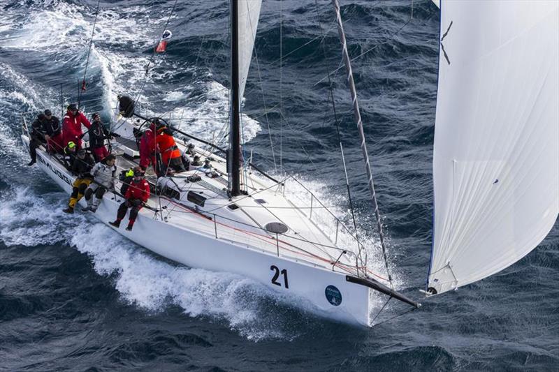 Seb Bohm and his team on board Smuggler as they left Sydney Harbour for their overall race winning run photo copyright Andrea Francolini taken at Cruising Yacht Club of Australia and featuring the IRC class