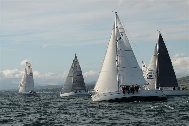 DDMT Off the Start line (foreground) - 42nd Three Peaks Yacht Race 2019 photo copyright Rob Howard / www.threepeaksyachtrace.co.uk taken at Merioneth Yacht Club and featuring the IRC class