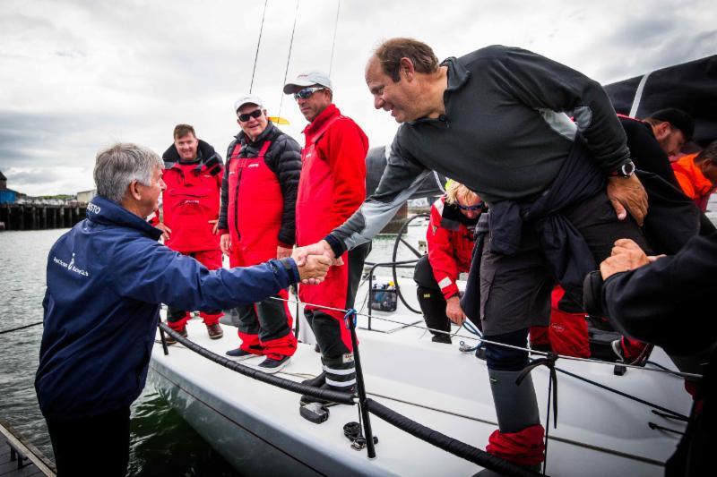 RORC CEO Eddie Warden Owen congratulates Ron O'Hanley and team on Privateer in the 2017 Rolex Fastnet Race photo copyright ELWJ Photography taken at Royal Ocean Racing Club and featuring the IRC class