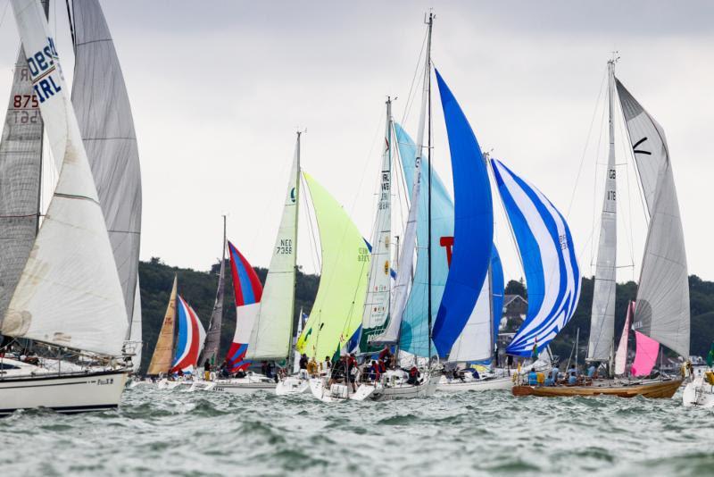 The colourful start of the largest class IRC Four - 2019 Rolex Fastnet Race photo copyright Paul Wyeth taken at Royal Ocean Racing Club and featuring the IRC class
