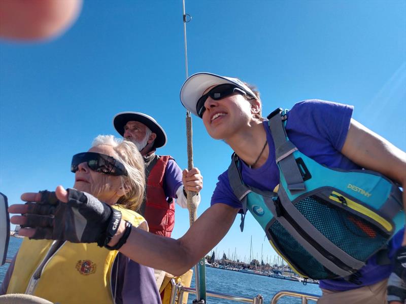 Instructor Alec Ligouri teaches us how to trim the mainsail. - photo © Susan Burden