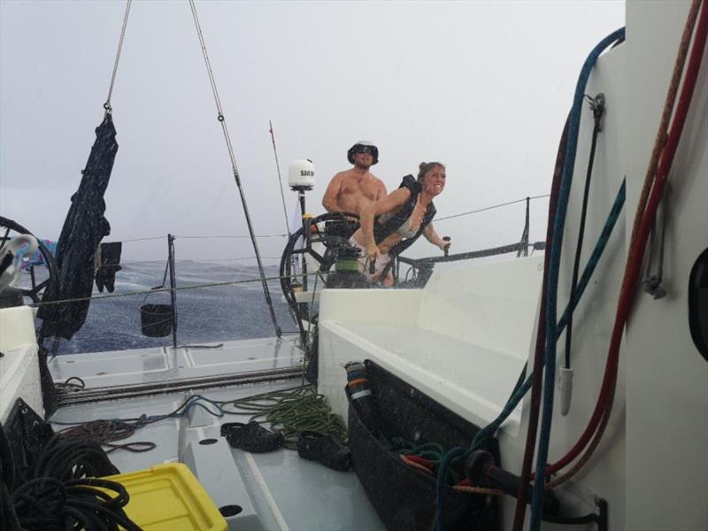 Skipper Andy Lis at the helm of Pata Negra, with Amy Seabright on kite trim - using an uber Atlantic squall to maximise performance - photo © Pata Negra Blog