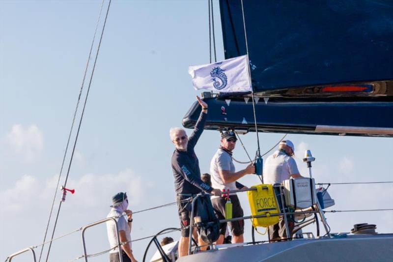 A fantastic welcome on the dock for Dark Shadow team at Camper & Nicholsons Port Louis Marina, Grenada photo copyright RORC / Arthur Daniel taken at Royal Ocean Racing Club and featuring the IRC class