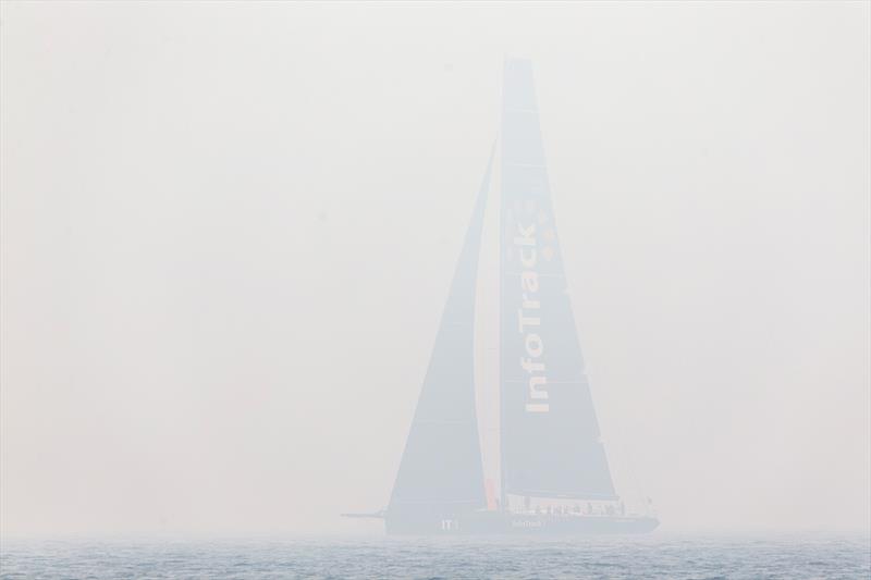 That is the supermaxi InfoTrack in that haze photo copyright Andrea Francolini taken at Cruising Yacht Club of Australia and featuring the IRC class