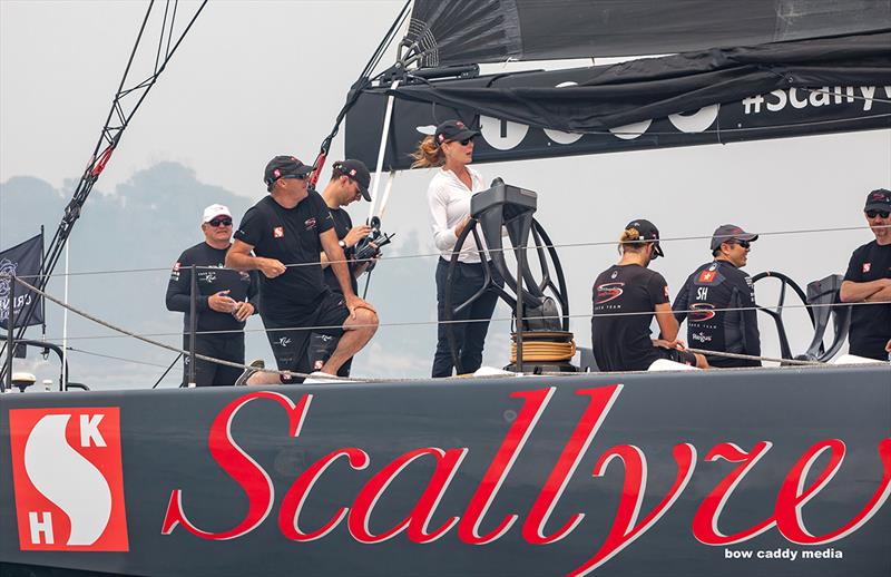 Taking a turn at the wheel of SHK Scallywag - 2019 Grinders Coffee SOLAS Bog Boat Challenge photo copyright Crosbie Lorimer taken at Cruising Yacht Club of Australia and featuring the IRC class