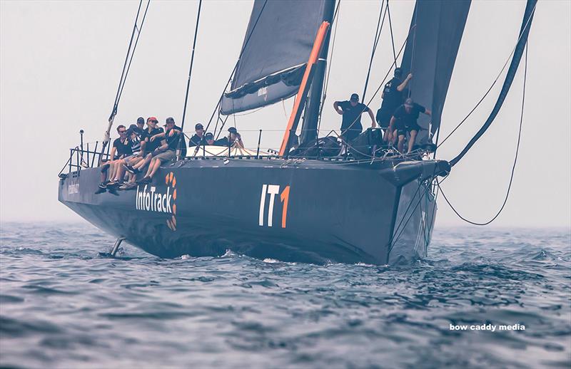 Infotrack looms out of the smoke - 2019 Grinders Coffee SOLAS Bog Boat Challenge photo copyright Crosbie Lorimer taken at Cruising Yacht Club of Australia and featuring the IRC class
