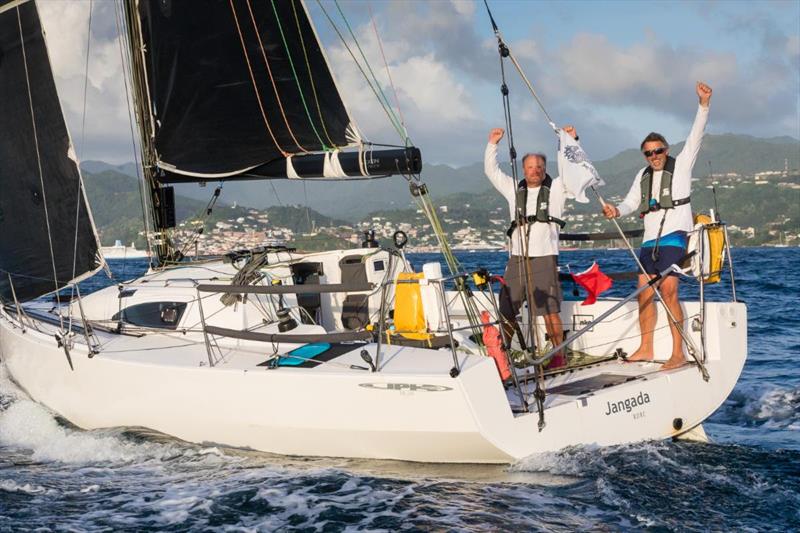 After 17 days and 10 hours, Jeremy Waiit (L) and Richard Palmer (R) cross the finish line outside Camper & Nicholsons Port Louis Marina, Grenada in the 2019 RORC Transatlantic Race - photo © RORC / Arthur Daniel