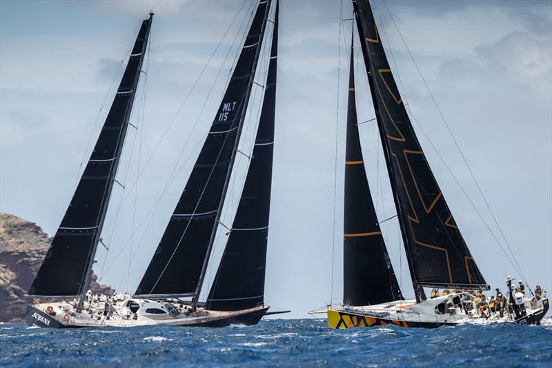 Lord Nelson Trophy defender Sojana sparrs with Ambersail during the 52nd Antigua Sailing Week photo copyright Paul Wyeth / pwpictures.com taken at Antigua Yacht Club and featuring the IRC class