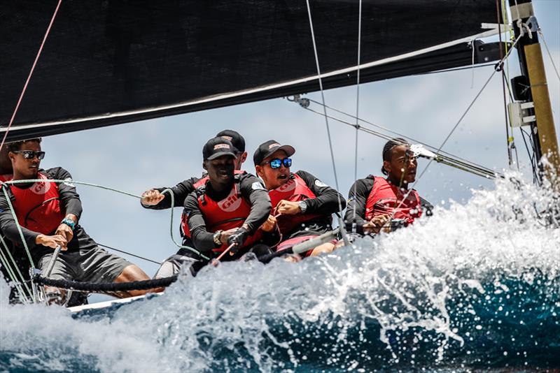 Jules Mitchell leading his team on NSA Spirit (ANU)  during the 2019 regatta - Antigua Sailing Week - photo © Paul Wyeth / pwpictures.com