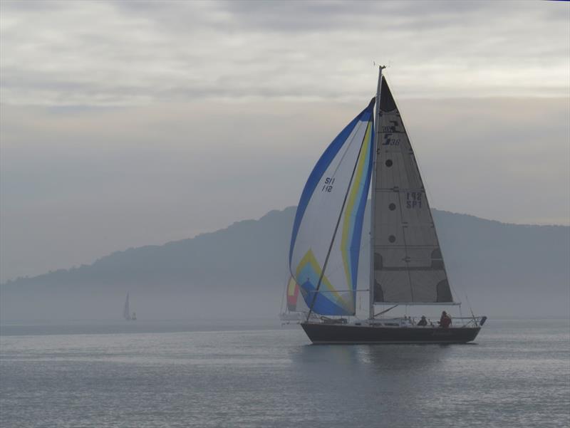 Hank Easom and Hans List drift with the current. Their Sabre Spirit 36 was second Doublehanded Monohull finisher - 2020 Three Bridge Fiasco  - photo © Susan Burden