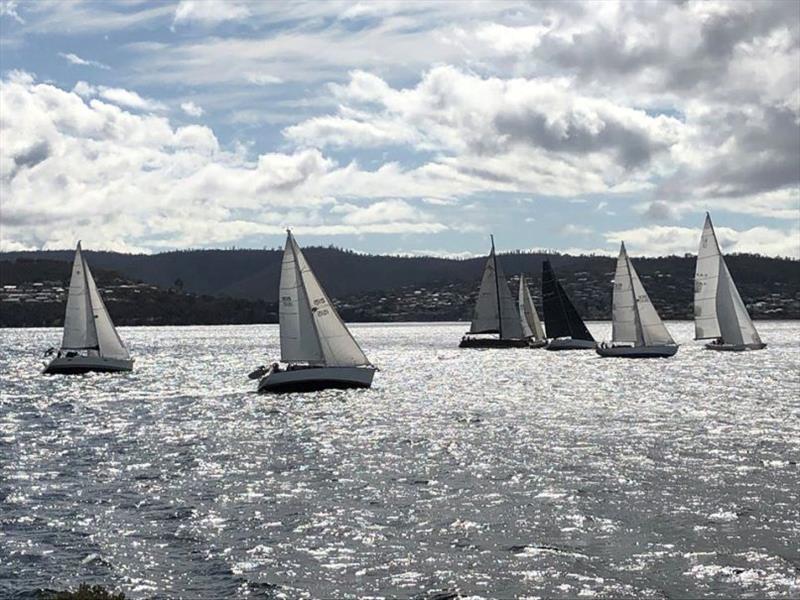 Start of the passage race from Friday to Kettering with GII crossing the fleet photo copyright Jessica Coughlan taken at Port Cygnet Sailing Club and featuring the IRC class
