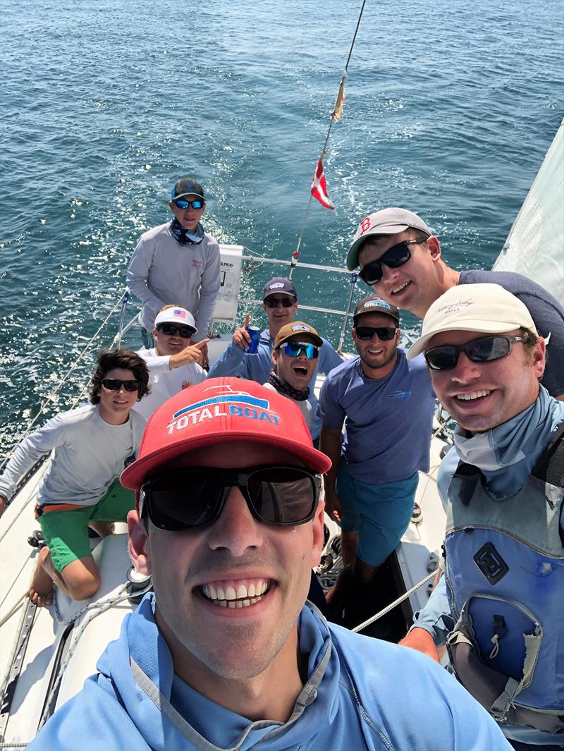The skipper of Kanga, Camden Tougas (right, white hat), with his crew. Forefront: tactician Ellis Tonissi; Far Rear: trimmer Luke Tougas photo copyright Team Kanga taken at Edgartown Yacht Club and featuring the IRC class