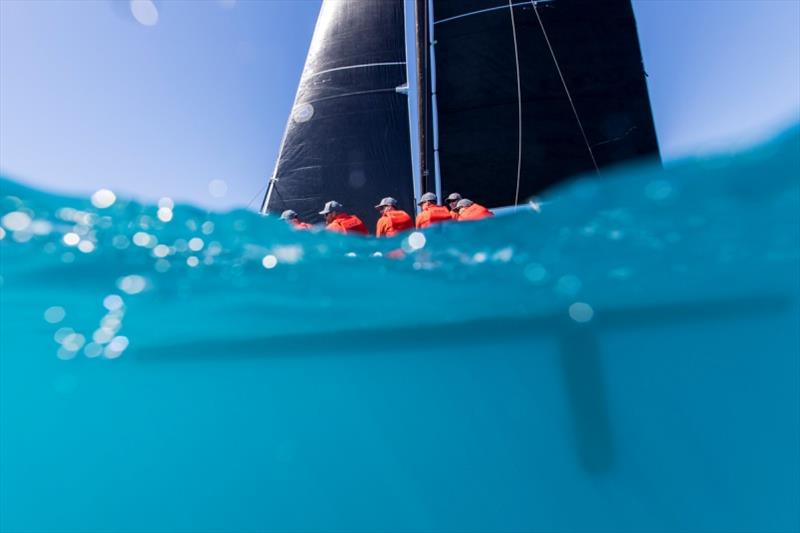 On and under water with Back in Black - Airlie Beach Race Week, day 3 photo copyright Andrea Francolini / ABRW taken at Whitsunday Sailing Club and featuring the IRC class