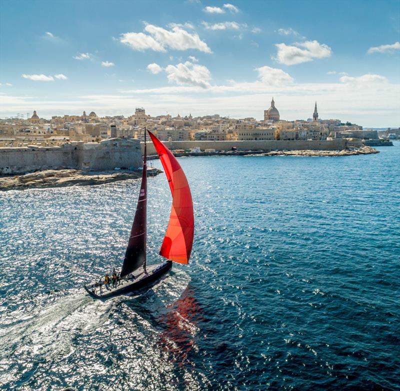 Eric de Turckheim's Teasing Machine arrives in Valletta to cross the Rolex Middle Sea Race finish line photo copyright Carlo Borlenghi / Rolex taken at Royal Malta Yacht Club and featuring the IRC class