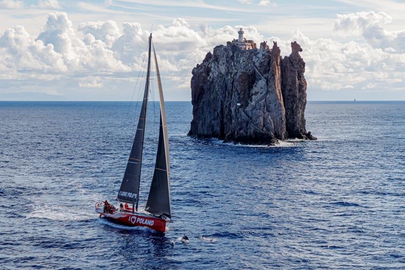 I Love Poland has marine wildlife for company as she passes Strombolicchio photo copyright Carlo Borlenghi / Rolex taken at Royal Malta Yacht Club and featuring the IRC class