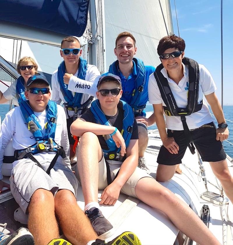 Crew racing Round the Island Race in 2018 photo copyright Ellen MacArthur Cancer Trust taken at Island Sailing Club, Cowes and featuring the IRC class