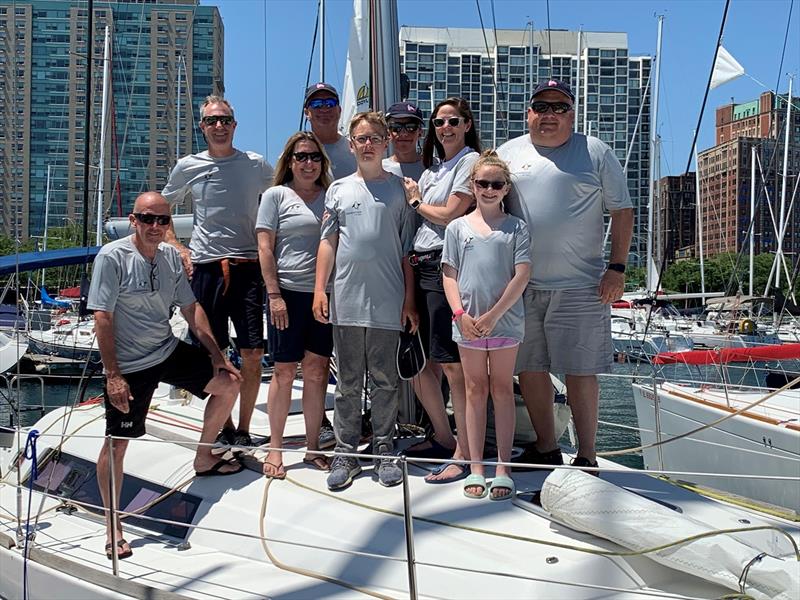 Crew of Endeavour including Charlie Gallagher (front middle), father Matt Gallagher (far right) and mother Emily Gallagher (to right of Charlie) photo copyright Jeff Pelch taken at Chicago Yacht Club and featuring the IRC class