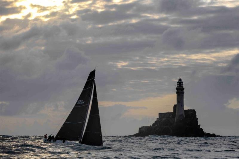 INO XXX at the Fastnet Rock photo copyright Rolex / Kurt Arrigo taken at Royal Ocean Racing Club and featuring the IRC class