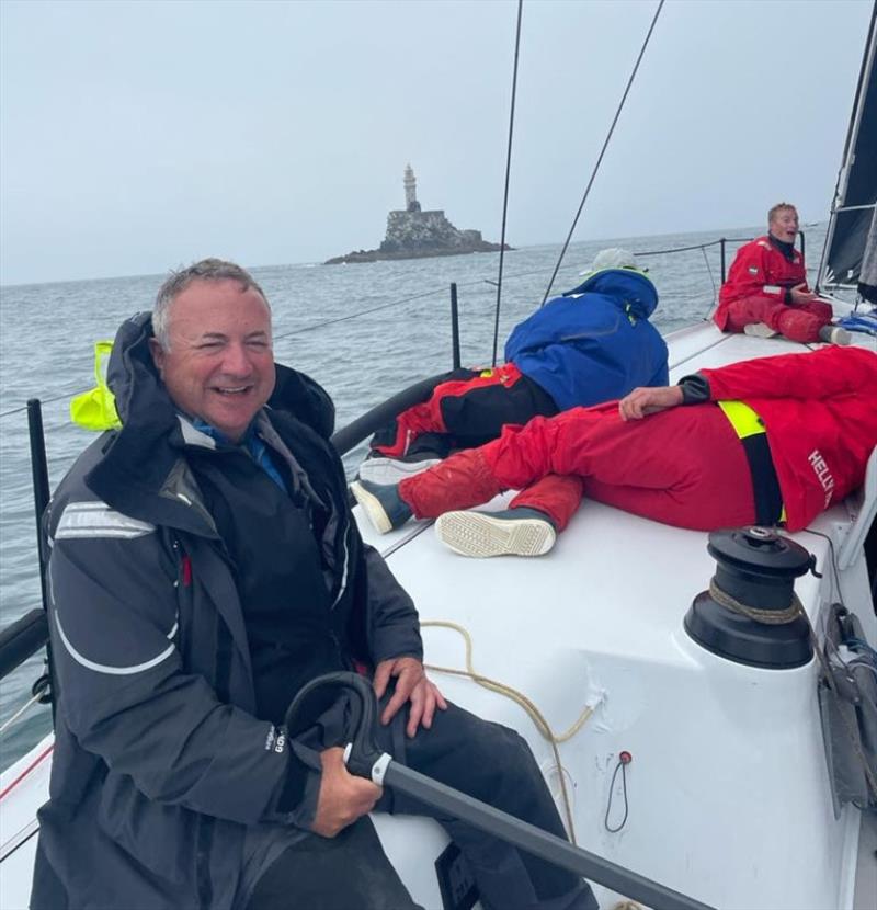 RORC Commodore, James Neville rounds the Fastnet Rock on his HH42 photo copyright RORC taken at Royal Ocean Racing Club and featuring the IRC class