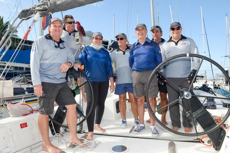 Mike Steel (left) wears a lot of hats at SMIRW here with his crew ready to race - 2021 SeaLink Magnetic Island Race Week photo copyright Scott Radford-Chisholm / SMIRW taken at Townsville Yacht Club and featuring the IRC class