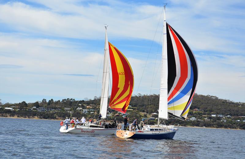 Invincible and Atilla passing South Arm during race 2 of the Hobart Combined Clubs Summer Pennant & Long Race Series photo copyright Ed Glover / Mike Faure taken at Royal Yacht Club of Tasmania and featuring the IRC class
