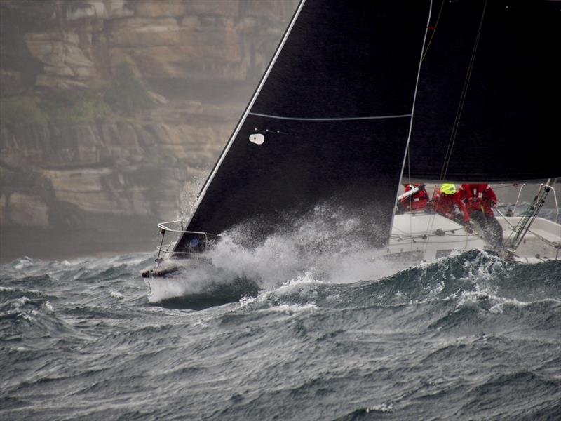 Philosopher in big seas at Sydney Heads on day 1 of the annual Sydney Short Ocean Racing Championship photo copyright Tilly McKnight Media taken at Middle Harbour Yacht Club and featuring the IRC class