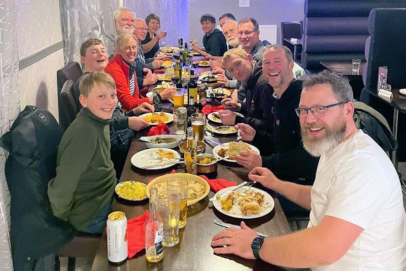 Crew curry in Pwllheli after the Pwllheli Winter Series - photo © Ben Cartwright