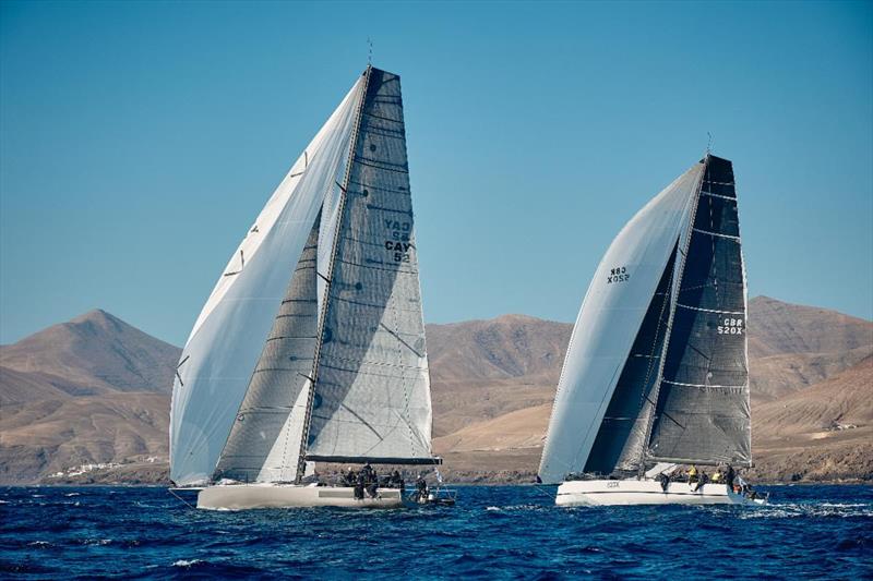 Max Klink's Botin 52 Caro (CH) and Tala (GBR) at the start of the RORC Transatlantic Race photo copyright James Mitchell taken at Royal Ocean Racing Club and featuring the IRC class