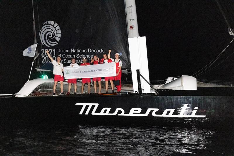 Celebrations on board Giovanni Soldini's Italian Multi70 Maserati after crossing the finish line in Grenada first after eight days of extraordinary racing in the RORC Transatlantic Race  - photo © RORC / Arthur Daniel