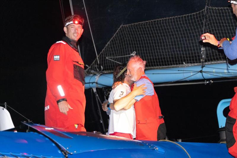 Friendly rivalry - Left: Ned Collier Wakefield, Right: Giovanni Soldini (Maserati) congratulations Peter Cunningham and the team on PowerPlay after their close battle across the Atlantic from Lanzarote - 2022 RORC Transatlantic Race - photo © RORC / Arthur Daniel