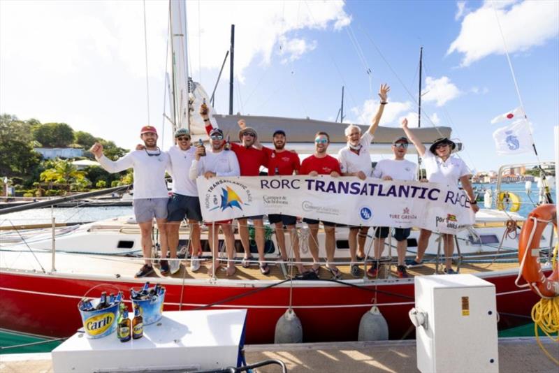 Celebrating dockside with a cold beer - Scarlet Oyster: Ross Applebey, Mark Emons, Robert Glanville, Emma Kettle, Matt Pitcher, Ben Pritchard, Timon Sitte, Alastair Whall, Julian White - photo © Arthur Daniel / RORC