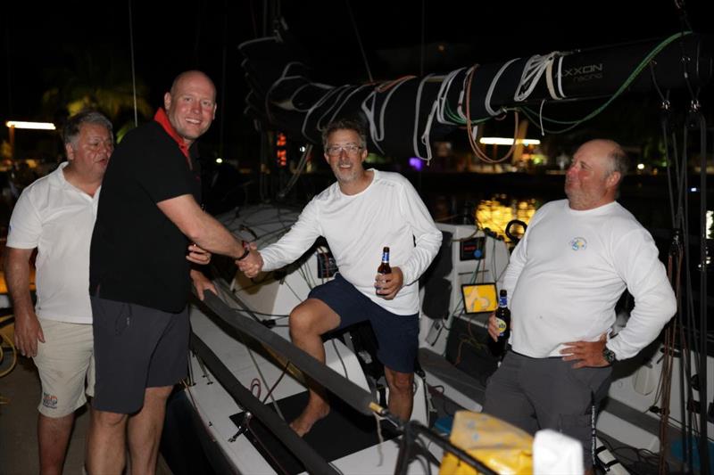 Scarlet Oyster's Ross Applebey welcomes Richard Palmer and Jeremy Waitt after finishing the RORC Transatlantic Race - photo © Arthur Daniel / RORC