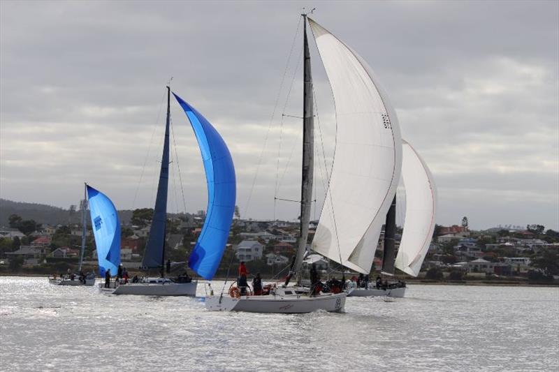 Eventual placegetters Sailient, Midnight Rambler and Whistler with Prima Donna soon after the start photo copyright Peter Watson taken at Royal Yacht Club of Tasmania and featuring the IRC class