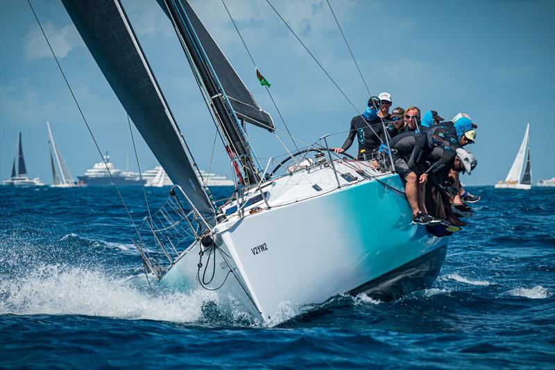 Liquid (J122) fights hard to stick with the fleet in the upwind leg, ultimately finishing 2nd in today's CSA7 race on day 1 of the St. Maarten Heineken Regatta - photo © Laurens Morel